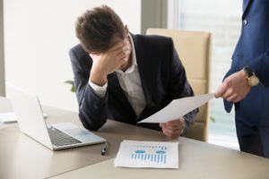 A distraught man talking to a bankruptcy lawyer in Putnam County, New York