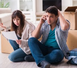 Worried young couple received foreclosure notice.